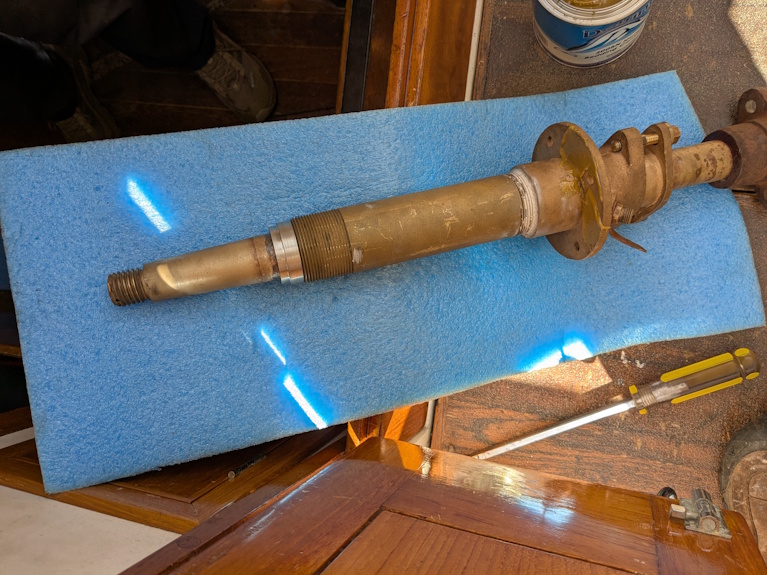 Tailpiece with shaft log and stuffing box installed.